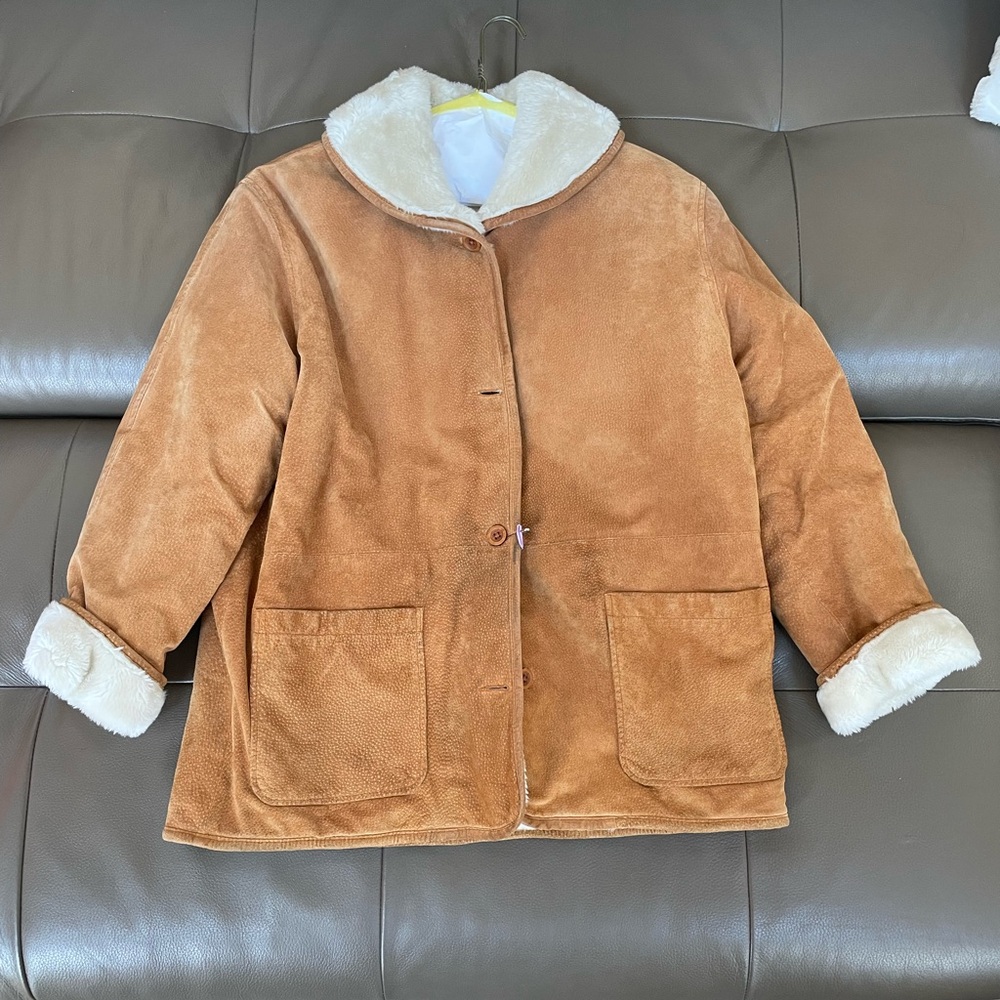 Thick brown jacket with white fur